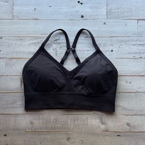 Lululemon black sports bra thick band can be clipped together in back size 6 EUC